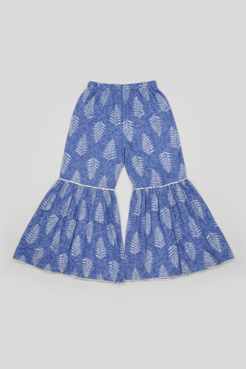 Blue floral-patterned skirt on a textured surface