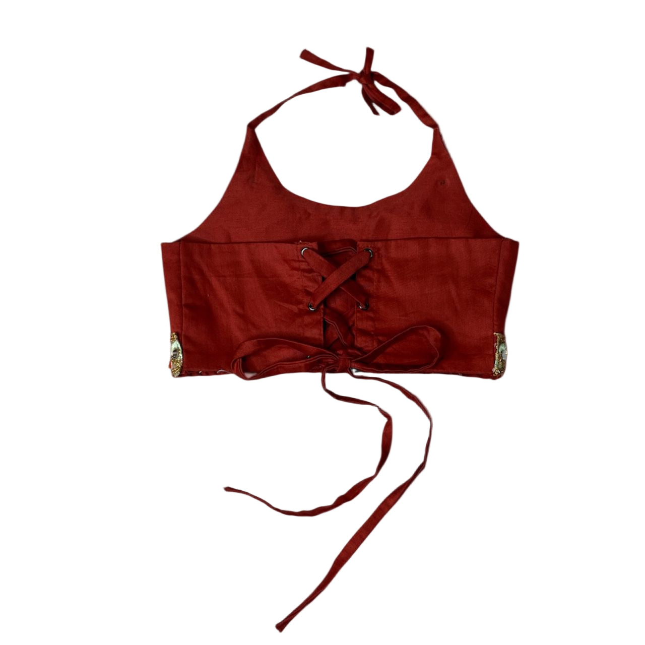 Red halter top with tie details on a pink background